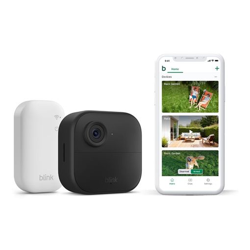 Blink Outdoor 4 camera and Sync Module Core mounted on a tree trunk